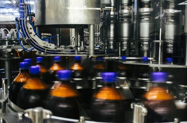 Pepsi bottles at bottling factory.